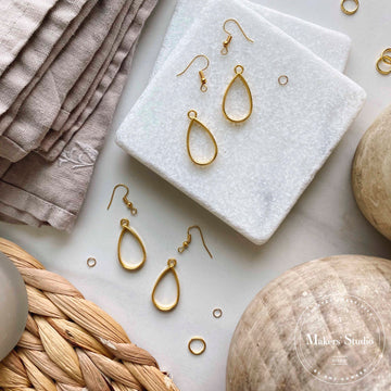 Teardrop Wood hotsell and Clear with Flecks of Gold- Earrings